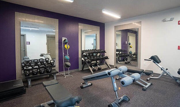 24-Hour Fitness Center With Locker Rooms, Premium Equipment, Free Weights & Spin Room